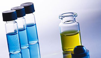 Liquid in laboratory bottles. Scientific biochemical laboratory
